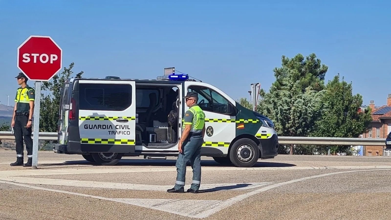 Two Guardia Civil Tráfico officers at a roadside check point